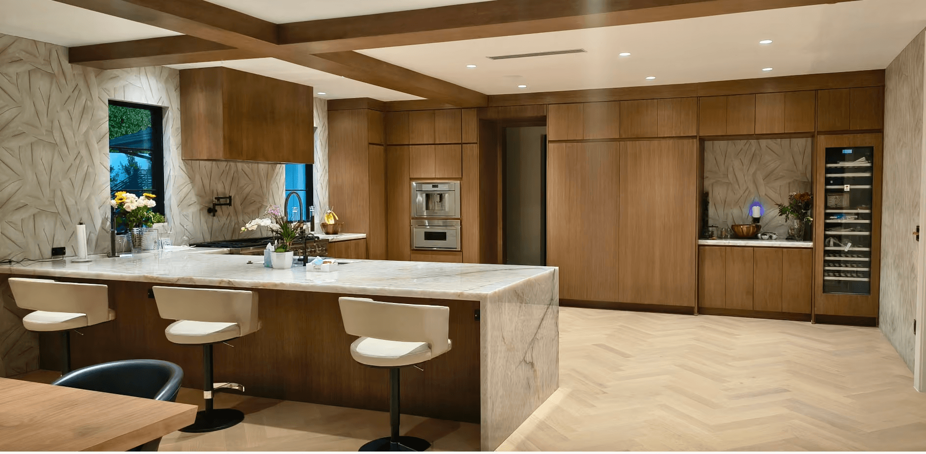 Custom wood kitchen cabinetry and island by Milhouse Woodworks