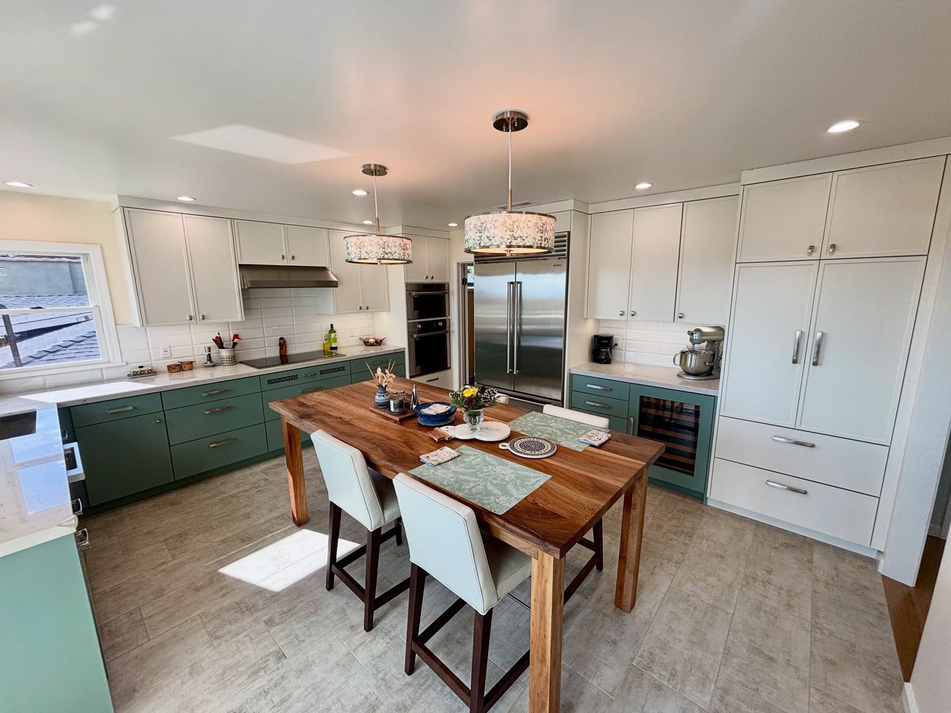 Two-tone European-style custom kitchen cabinetry designed, fabricated, and installed by Milhouse Woodworks in San Pedro